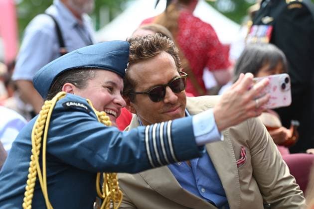July 1, 2025, Ottawa, On, Canada: Actor Ryan Reynolds poses for selfie photo with a member of the Royal Canadian Air Force during Canada Day celebrations at LeBreton Flats in Ottawa on Tuesday, July 1, 2025. Ottawa Canada  - ZUMAc35_ 20250701_zaf_c35_020 Copyright: xSpencerxColbyx