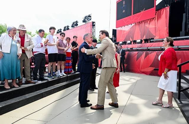 July 1, 2025, Ottawa, On, Canada: Prime Minister Mark Carney shakes hands with Canadian-American actor Ryan Reynolds during Canada Day celebrations at LeBreton Flats in Ottawa on Tuesday, July 1, 2025. Ottawa Canada  - ZUMAc35_ 20250701_zaf_c35_044 Copyright: xSpencerxColbyx