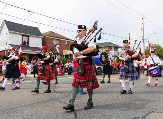 (250701) -- TORONTO, July 1, 2025 -- A pipe band marches during the 2025 Canada Day Parade in Toronto, Canada, on July 1, 2025. (Photo by Xinhua) CANADA-TORONTO-CANADA DAY-PARADE ZouxZheng 
