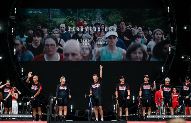 July 1, 2025, Ottawa, On, Canada: Darrell Fox (centre), brother to the late-Terry Fox, raises his fist into the air after being honoured on stage during Canada Day celebrations at LeBreton Flats in Ottawa, on Tuesday, July 1, 2025. Ottawa Canada  - ZUMAc35_ 20250701_zaf_c35_089 Copyright: xSpencerxColbyx
