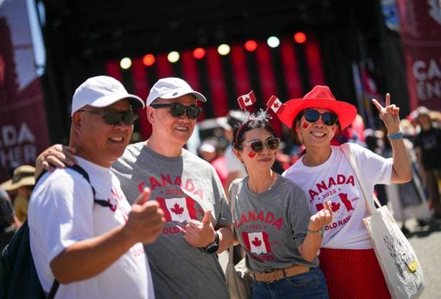 July 1, 2025, Vancouver, Bc, CANADA: Patriotically dressed people pose for photos together during Canada Day festivities, in Vancouver, on Tuesday, July 1, 2025. Vancouver CANADA  - ZUMAc35_ 20250701_zaf_c35_102 Copyright: xDarrylxDyckx