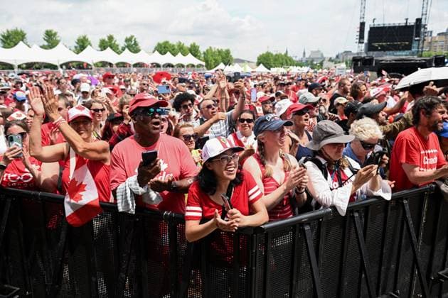 July 1, 2025, Ottawa, On, Canada: Spectators cheer on as Prime Minister Mark Carney, not pictured, delivers remarks during Canada Day celebrations at LeBreton Flats in Ottawa, on Tuesday, July 1, 2025. Ottawa Canada  - ZUMAc35_ 20250701_zaf_c35_134 Copyright: xSpencerxColbyx