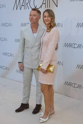 Roman Keating and Strom Keating guest arrival at the Marccain Spring Summer 2026 Fashion Show A Quit Rebellion at Pei Bau in Berlin on 01 07 2025 Marccain Spring Summer 2026 Fashion Show