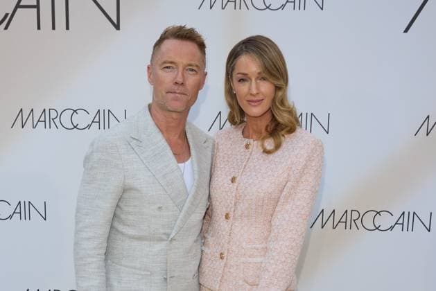 Roman Keating and Strom Keating guest arrival at the Marccain Spring Summer 2026 Fashion Show A Quit Rebellion at Pei Bau in Berlin on 01 07 2025 Marccain Spring Summer 2026 Fashion Show