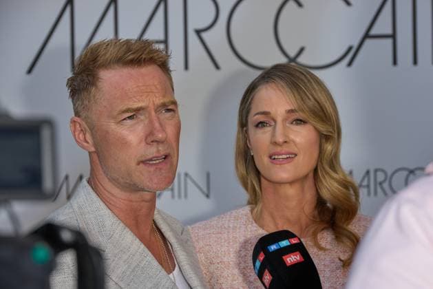 Roman Keating and Strom Keating guest arrival at the Marccain Spring Summer 2026 Fashion Show A Quit Rebellion at Pei Bau in Berlin on 01 07 2025 Marccain Spring Summer 2026 Fashion Show