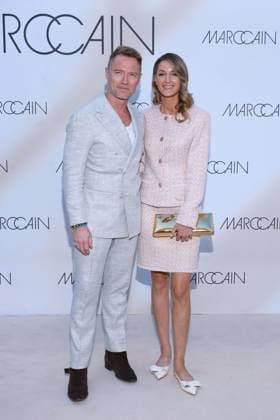 Ronan Keating and his wife Storm Keating at the Marc Cain A Quiat Rebellion fashion show on 1 07 2025 at the Pei Bau in Berlin Marc Cain Fashion Show in Berlin