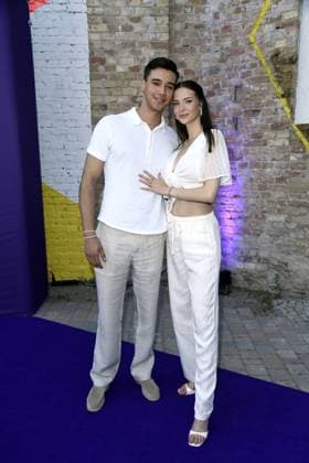 San Diego Pooth with girlfriend Louisa Büscher at the LASCANA SUMMER CLUB as part of Berlin Fashion Week at Maaya in Berlin on 02 07 2025