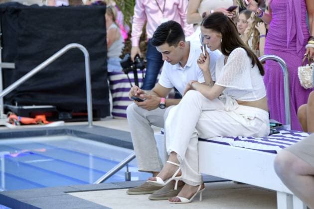 San Diego Pooth with girlfriend Louisa Büscher at the LASCANA SUMMER CLUB as part of Berlin Fashion Week at Maaya in Berlin on 02 07 2025