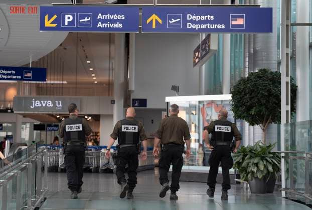July 3, 2025, Dorval, Pq, CANADA: Nav Canada says early morning bomb threats affected airports in Ottawa, Montreal, Edmonton, Winnipeg, Calgary and Vancouver on Thursday. Surete du Quebec (SQ) police officers walk through Montreal-Trudeau International Airport in Dorval, Que., on Thursday, July 3, 2025. Dorval CANADA - ZUMAc35_ 20250703_zaf_c35_010 Copyright: xChristinnexMuschix