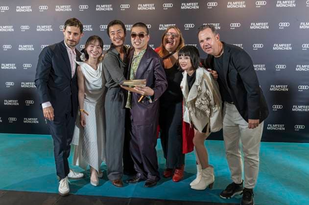 Clemens Schick , Soujiro Sanada with team and Anna Hints at the award ceremony at the 42 Filmfest München 2025 in the Amerikahaus Munich, 05 07 2025 Foto:xN.xKolinzx xFuturexImagex preisverleihung_5719