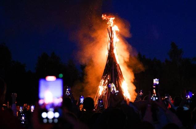 RUSSIA, MOSCOW REGION - JULY 5, 2025: A bonfire is seen during festivities marking Ivan Kupala Day, a pagan summer solstice celebration, at the Vasilkovoye Ozero holiday park. Valeria Kalugina TASS  82256442