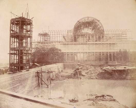RECORD DATE NOT STATED The North end of the Building from the Reservoir, Crystal Palace, Sydenham, 1852-1854. Designed by Sir Joseph Paxton to house the Great Exhibition of 1851 in Hyde Park, the Crystal Palace was reconstructed and enlarged in Sydenham in 1852. The first column was raised on 5 August 1852 and the palace was opened by Queen Victoria on 10 June 1854. Many exhibitions and events were subsequently held at the Crystal Palace until it burnt down on 30 November 1936. The park contained a motor racing circuit from 1937 until 1972 and the famous athletics track dates back to the foundation of the Crystal Palace Athletics Club in 1868. Plate 20 from Photographic Views of the Progress of the Crystal Palace, Sydenham. Taken during the progress of the works,  Copyright:HeritagexArt HeritagexImagesxPhilipxHenryxDelamottex IMAGO