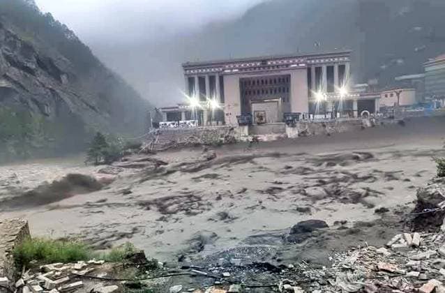 News Themen der Woche KW28 July 8, 2025: Photo taken from social sites shows the flooded river which swept away the Nepal-China Friendship Bridge at Rasuwagadhi border point in Rasuwa, Nepal on July 8,2025. The Nepal-China Friendship Bridge, a key bridge on the trade route between Nepal and China has been swept away and vehicles parked at the customs yard have been washed off by the flooded Bhotekoshi River in Rasuwagadhi early Tuesday morning, July 8, officials said. - ZUMAs233 20250708_zap_s233_001 Copyright: xSunilxSharmax