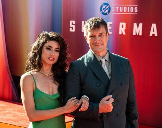 July 7, 2025, Hollywood, California, USA: Nathan Fillion and his friend arrive together on the red carpet of the Superman red carpet premiere at the TCL Chinese theater in Hollywood California on July 7th, 2025 Hollywood USA - ZUMAt169 20250707_zep_t169_019 Copyright: xConnorxTerryx