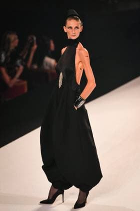 PFW - Stephane Rolland Runway in Paris FA A model walks the runway for a collection by Stephane Rolland as part of Paris Fashion Week at the Theatre of the Champs-Elysees in Paris, on July 8, 2025. Photo by Firas Abdullah ABACAPRESS.COM Paris Ile-de-France France  Copyright: xAbdullahxFiras ABACAx