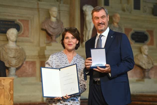 Janina HARTWIG receives the Bavarian Order of Merit from Markus SOEDER State Premier of Bavaria and CSU Chairman Bavarian Order of Merit Award Ceremony in the Antiquariat of the Residence in Munich on 09 07 2025