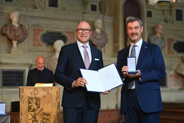Alexander HOLD receives the Bavarian Order of Merit from Markus SOEDER State Premier of Bavaria and CSU Chairman Bavarian Order of Merit Award Ceremony in the Antiquariat of the Residence in Munich on 09 07 2025