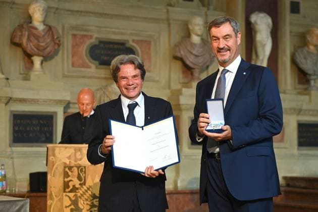 Michael KAEFER receives the Bavarian Order of Merit from Markus SOEDER State Premier of Bavaria and CSU Chairman Bavarian Order of Merit Award Ceremony in the Antiquariat of the Residence in Munich on 09 07 2025