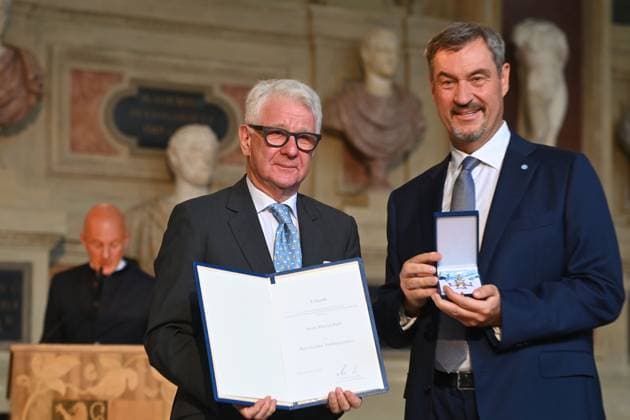 Marcel REIF receives the Bavarian Order of Merit from Markus SOEDER State Premier of Bavaria and CSU Chairman Bavarian Order of Merit Award Ceremony in the Antiquariat of the Residence in Munich on 09 07 2025