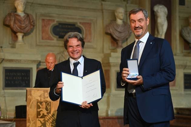 Michael KAEFER receives the Bavarian Order of Merit from Markus SOEDER State Premier of Bavaria and CSU Chairman Bavarian Order of Merit Award Ceremony in the Antiquariat of the Residence in Munich on 09 07 2025