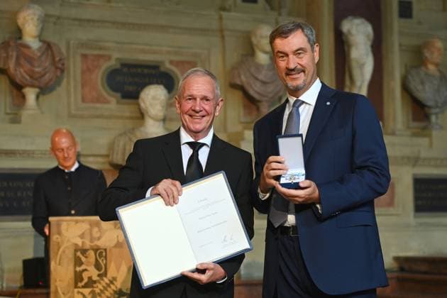 Fritz EGNER receives the Bavarian Order of Merit from Markus SOEDER State Premier of Bavaria and CSU Chairman Bavarian Order of Merit Award Ceremony in the Antiquariat of the Residence in Munich on 09 07 2025