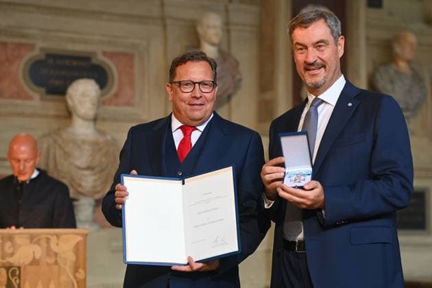 Robert POELZER receives the Bavarian Order of Merit from Markus SOEDER State Premier of Bavaria and CSU Chairman Bavarian Order of Merit Award Ceremony in the Antiquariat of the Residence in Munich on 09 07 2025