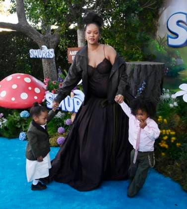 3Rihanna, the voice of Smurfette in the animated musical comedy Smurfs and her sons Riot Rose Mayers (L) and RZA Athelston Mayers attend the premiere of the motion picture at Paramount Studios in Los Angeles on Sunday, July 13, 2025. Storyline: When Papa Smurf (John Goodman) is mysteriously taken by evil wizards, Razamel and Gargamel, Smurfette (Rihanna) leads the Smurfs on a mission into the real world to save him. With the help of new friends, the Smurfs must discover what defines their destiny to save the universe.  LAP2025071307 JIMxRUYMEN
