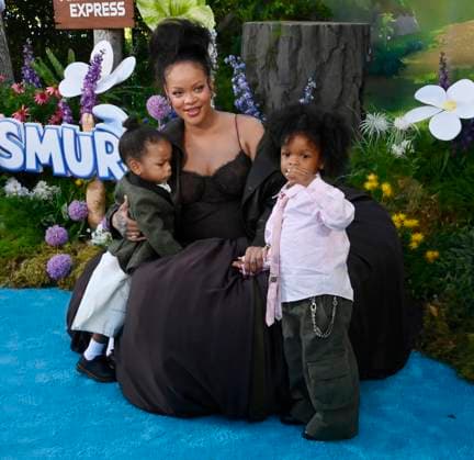 Rihanna, the voice of Smurfette in the animated musical comedy Smurfs and her sons Riot Rose Mayers (L) and RZA Athelston Mayers attend the premiere of the motion picture at Paramount Studios in Los Angeles on Sunday, July 13, 2025. Storyline: When Papa Smurf (John Goodman) is mysteriously taken by evil wizards, Razamel and Gargamel, Smurfette (Rihanna) leads the Smurfs on a mission into the real world to save him. With the help of new friends, the Smurfs must discover what defines their destiny to save the universe.  LAP2025071310 JIMxRUYMEN