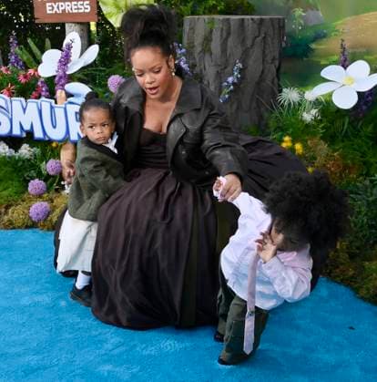Rihanna, the voice of Smurfette in the animated musical comedy Smurfs and her sons Riot Rose Mayers (L) and RZA Athelston Mayers attend the premiere of the motion picture at Paramount Studios in Los Angeles on Sunday, July 13, 2025. Storyline: When Papa Smurf (John Goodman) is mysteriously taken by evil wizards, Razamel and Gargamel, Smurfette (Rihanna) leads the Smurfs on a mission into the real world to save him. With the help of new friends, the Smurfs must discover what defines their destiny to save the universe.  LAP2025071311 JIMxRUYMEN