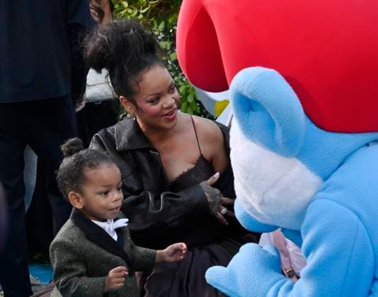 Rihanna, the voice of Smurfette in the animated musical comedy Smurfs and her son Riot Rose Mayers attend the premiere of the motion picture at Paramount Studios in Los Angeles on Sunday, July 13, 2025. Storyline: When Papa Smurf (John Goodman) is mysteriously taken by evil wizards, Razamel and Gargamel, Smurfette (Rihanna) leads the Smurfs on a mission into the real world to save him. With the help of new friends, the Smurfs must discover what defines their destiny to save the universe.  LAP2025071315 JIMxRUYMEN