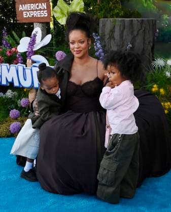 Rihanna, the voice of Smurfette in the animated musical comedy Smurfs and her sons Riot Rose Mayers (L) and RZA Athelston Mayers attend the premiere of the motion picture at Paramount Studios in Los Angeles on Sunday, July 13, 2025. Storyline: When Papa Smurf (John Goodman) is mysteriously taken by evil wizards, Razamel and Gargamel, Smurfette (Rihanna) leads the Smurfs on a mission into the real world to save him. With the help of new friends, the Smurfs must discover what defines their destiny to save the universe.  LAP2025071309 JIMxRUYMEN