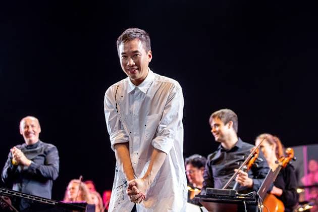 Film music composer Jung Jaeil and Janacek Philharmonic Ostrava perform during the third day of the 22nd international music festival Colours of Ostrava in Ostrava, Czech Republic, on July 18, 2025. (CTKxPhoto VladimirxPrycek) CTKPhotoP2025071807299  CTKPhotoP2025071807299