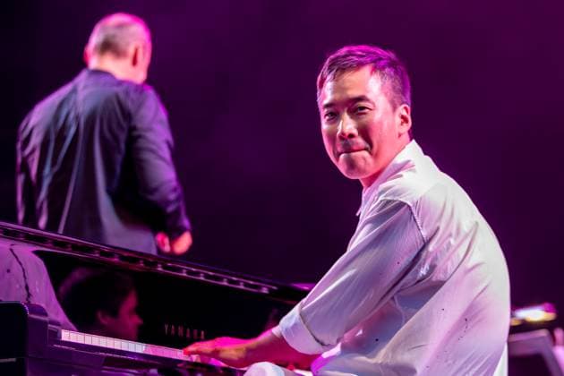 Film music composer Jung Jaeil and Janacek Philharmonic Ostrava perform during the third day of the 22nd international music festival Colours of Ostrava in Ostrava, Czech Republic, on July 18, 2025. (CTKxPhoto VladimirxPrycek) CTKPhotoP2025071807308  CTKPhotoP2025071807308