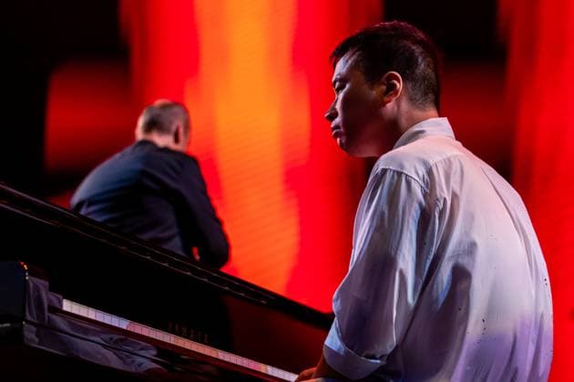 Film music composer Jung Jaeil and Janacek Philharmonic Ostrava perform during the third day of the 22nd international music festival Colours of Ostrava in Ostrava, Czech Republic, on July 18, 2025. (CTKxPhoto VladimirxPrycek) CTKPhotoP2025071807320  CTKPhotoP2025071807320