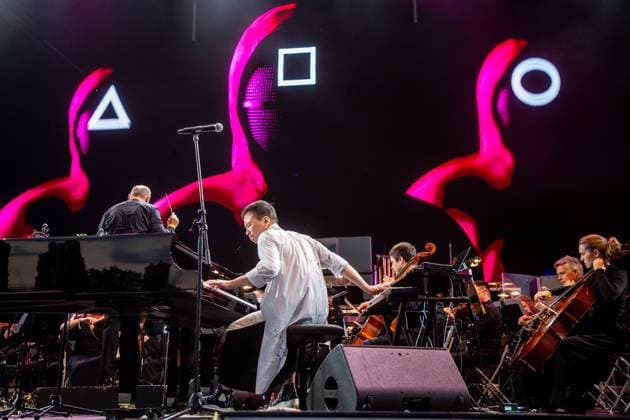 Film music composer Jung Jaeil and Janacek Philharmonic Ostrava perform during the third day of the 22nd international music festival Colours of Ostrava in Ostrava, Czech Republic, on July 18, 2025. (CTKxPhoto VladimirxPrycek) CTKPhotoP2025071807324  CTKPhotoP2025071807324
