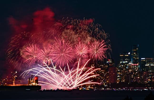 (250720) -- VANCOUVER, July 20, 2025 -- Fireworks light up the sky during the 2025 Celebration of Light at English Bay in Vancouver, British Columbia, Canada, July 19, 2025. The 33rd Celebration of Light fireworks show kicked off here Saturday. This year s event features an all-Canadian lineup, with pyrotechnic teams from Yukon, Quebec, and Nova Scotia scheduled to perform on July 19, 23, and 26, respectively. (Photo by Xinhua) CANADA-VANCOUVER-FIREWORKS LiangxSen