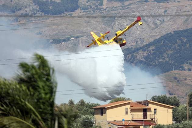 Firefighting efforts continue for the wildfire broke out in Italy SICILY, ITALY - JULY 20: Firefighting efforts continue from the air for the forest fire which broke out at Mediterranean scrubs between Partinico and Alcamo, western of Sicily, Italy on July 20, 2025. Alberto Lo Bianco Anadolu Sicily Italy. Editorial use only. Please get in touch for any other usage.  Copyright: x2025xAnadoluxAlbertoxLoxBiancox