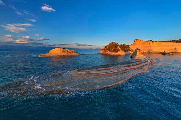 Creative Highlights World Sunset view of Cap Drastis coast in Corfu Ionian Islands Greece, ANSF01534