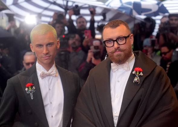 Celebrities head to The Met Gala: Departures from The Mark Hotel NEW YORK CITY, US - MAY 5: Christian Cowan and Sam Smith leave New York s luxury Mark Hotel to attend the 2025 Met Gala, Superfine: Tailoring Black Style at the Metropolitan Museum of Art in New York City, United States on May 5, 2025. New York United States. Editorial use only. Please get in touch for any other usage.  Copyright: x2025xAnadoluxSelcukxAcarx