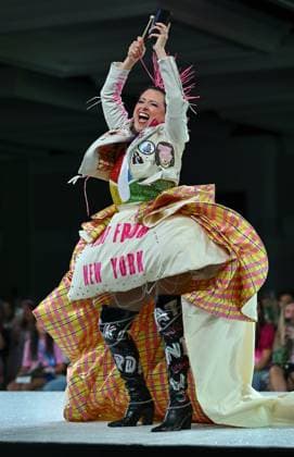 Designer Margaret Kidwell wears her design entry as she walks down the runway at the 11th Annual Her Universe Fashion Show during Comic-Con at the Seaport Ballroom of the Manchester Grand Hyatt in San Diego, California on Thursday, July 24, 2025. The fan-favorite event showcases work from designers across the country competing for the opportunity to design an exclusive apparel collection with Her Universe.  SDI20250724129 CHRISxCHEW