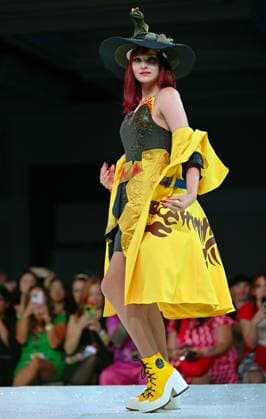 Designer Cat Gravereaux shows off her geek couture outfit as she walks down the runway at the 11th Annual Her Universe Fashion Show during Comic-Con at the Seaport Ballroom of the Manchester Grand Hyatt in San Diego, California on Thursday, July 24, 2025. The fan-favorite event showcases work from designers across the country competing for the opportunity to design an exclusive apparel collection with Her Universe.  SDI20250724138 CHRISxCHEW