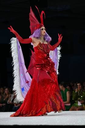 Designer Leah Mednick wears her entry design as she walks down the runway at the 11th Annual Her Universe Fashion Show during Comic-Con at the Seaport Ballroom of the Manchester Grand Hyatt in San Diego, California on Thursday, July 24, 2025. The fan-favorite event showcases work from designers across the country competing for the opportunity to design an exclusive apparel collection with Her Universe.  SDI20250724143 CHRISxCHEW
