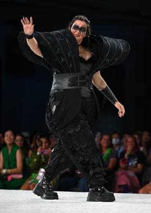 Aspiring designers show off their geek couture outfits as they walk down the runway at the 11th Annual Her Universe Fashion Show during Comic-Con at the Seaport Ballroom of the Manchester Grand Hyatt in San Diego, California on Thursday, July 24, 2025. The fan-favorite event showcases work from designers across the country competing for the opportunity to design an exclusive apparel collection with Her Universe.  SDI20250724151 CHRISxCHEW