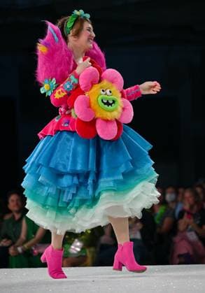 Aspiring designers show off their geek couture outfits as they walk down the runway at the 11th Annual Her Universe Fashion Show during Comic-Con at the Seaport Ballroom of the Manchester Grand Hyatt in San Diego, California on Thursday, July 24, 2025. The fan-favorite event showcases work from designers across the country competing for the opportunity to design an exclusive apparel collection with Her Universe.  SDI20250724152 CHRISxCHEW