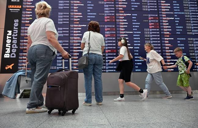 Russia Aeroflot Schedule Cancellation 8972866 28.07.2025 Passengers gather near the information board after Aeroflot flights were cancelled or delayed due to a failure in the company s information systems, at the Sheremetyevo International Airport outside Moscow, Russia. Kirill Kallinikov Sputnik Moscow Russia  Copyright: xKirillxKallinikovx