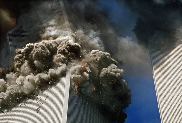America Under Attack 9 11: NYC Ground Zero Sep 11, 2001; New York, NY, U.S.; The south tower of the World Trade Center, left, begins to collapse in New York Tuesday Sept. 11. 2001. In the most horrifying attacks ever against the United States, terrorists crashed two airliners into the World Trade center in a deadly series of blows that brought down the twin 110-story towers Copyright: xGulnaraxSamoilovax