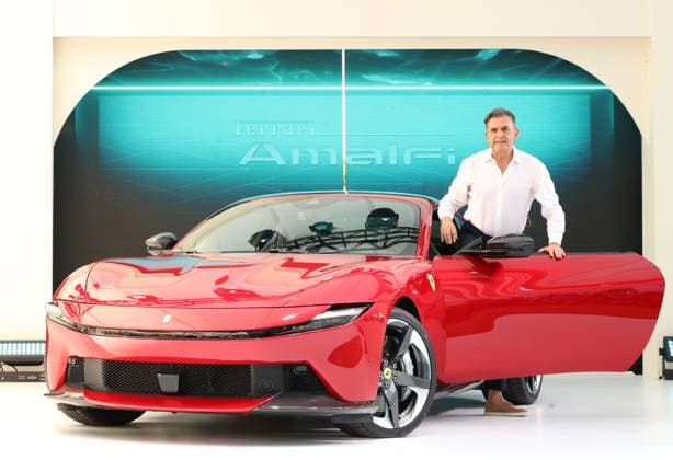July 29, 2025, Tokyo, Japan - Ferrari Japan president Donalto Romaniello displays the new sports coupe Ferrari Amalfi in Tokyo on Tuesday, July 29, 2025. The Ferrari Amalfi has 3855cc V8 turbo charged engine, mounted on the front midship, drives rear wheels with maximum speed of 320kph . (photo by Yoshio Tsunoda AFLO)  aflo_299000322