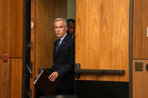 July 30, 2025, Ottawa, On, Canada: Prime Minister Mark Carney arrives for a news conference in Ottawa, Wednesday, July 30, 2025. Ottawa Canada  - ZUMAc35_ 20250730_zaf_c35_101 Copyright: xAdrianxWyldx