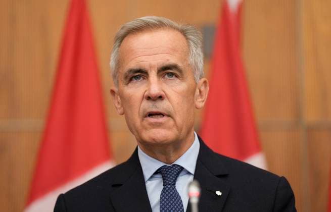 July 30, 2025, Ottawa, On, Canada: Prime Minister Mark Carney speaks with media during a news conference in Ottawa, Wednesday, July 30, 2025. Ottawa Canada  - ZUMAc35_ 20250730_zaf_c35_102 Copyright: xAdrianxWyldx