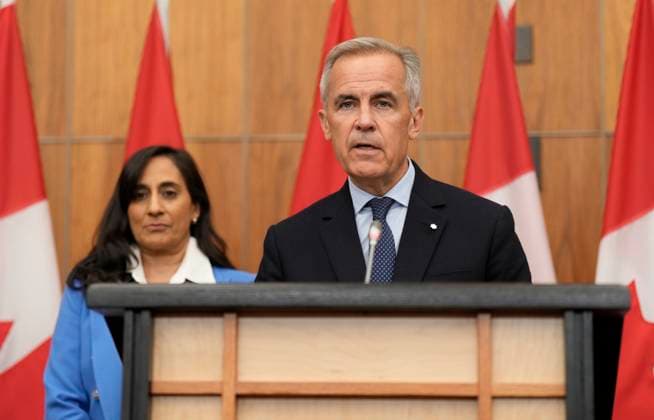 July 30, 2025, Ottawa, On, Canada: Prime Minister Mark Carney speaks with media during a news conference in Ottawa, Wednesday, July 30, 2025. Ottawa Canada  - ZUMAc35_ 20250730_zaf_c35_104 Copyright: xAdrianxWyldx